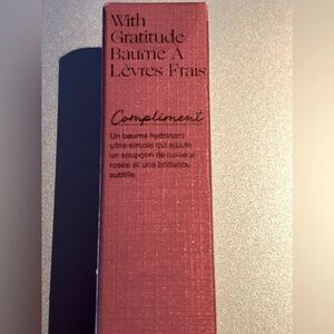 Empathy rose mauve in .10 oz. Gloss with buildable color.